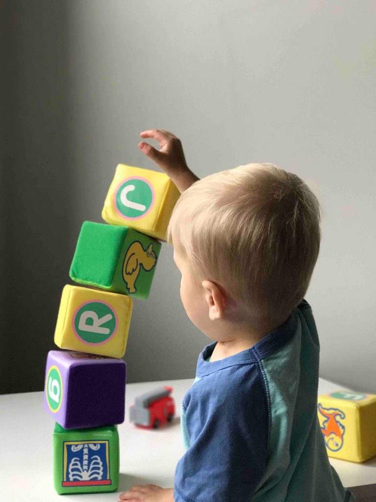 child enjoying exploring and creating new things - Treehouse Early Learning Marsden Qld